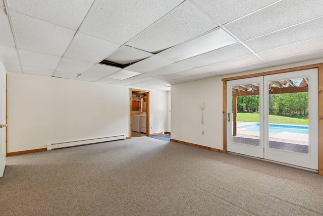 198 Range Rd, Cumberland, ME 04021 - unfurnished room featuring baseboard heating, washer / dryer, carpet, a drop ceiling, and baseboards