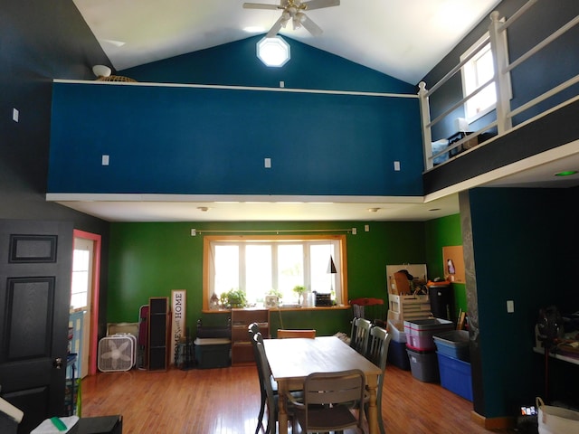 56 Allen St, Bangor, ME 04401 - dining area with high vaulted ceiling, a ceiling fan, wood finished floors, and plenty of natural light