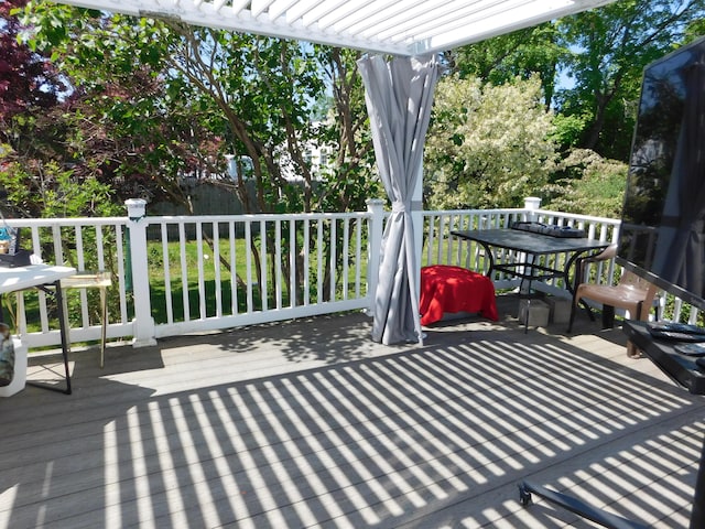 56 Allen St, Bangor, ME 04401 - wooden deck featuring a pergola and outdoor dining area