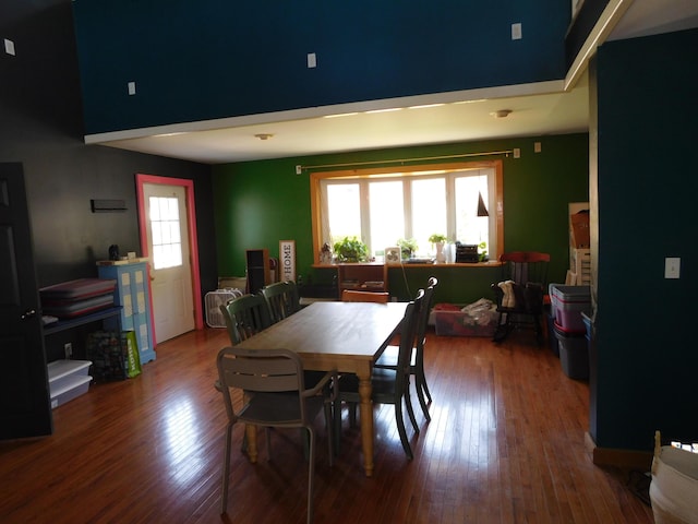 56 Allen St, Bangor, ME 04401 - dining area with a towering ceiling, healthy amount of natural light, and wood finished floors