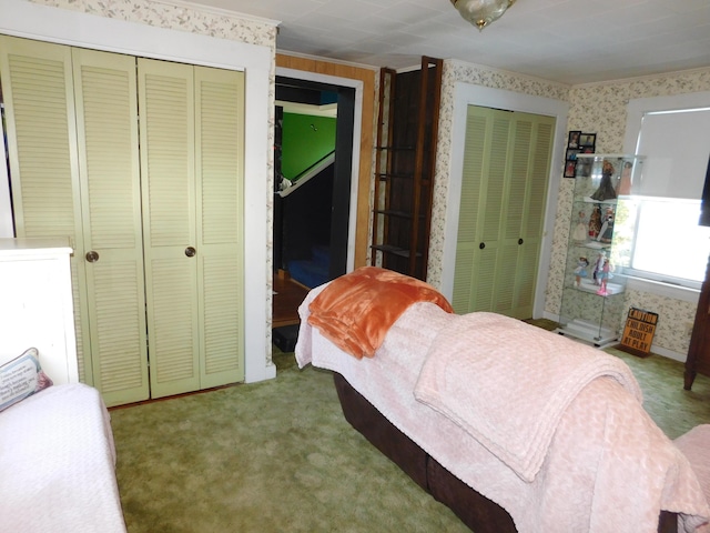 56 Allen St, Bangor, ME 04401 - bedroom featuring wallpapered walls, multiple closets, and carpet flooring