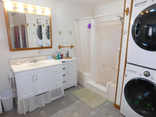 56 Allen St, Bangor, ME 04401 - bathroom featuring stacked washer / drying machine, a shower with shower curtain, and vanity