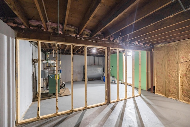 4 Scribner Cir, Lewiston, ME 04240 - unfinished basement with oil tank and a heating unit