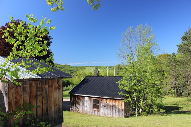 35 Harmon Notch Rd, Brownfield, ME 04010 - view of grassy yard with an outbuilding