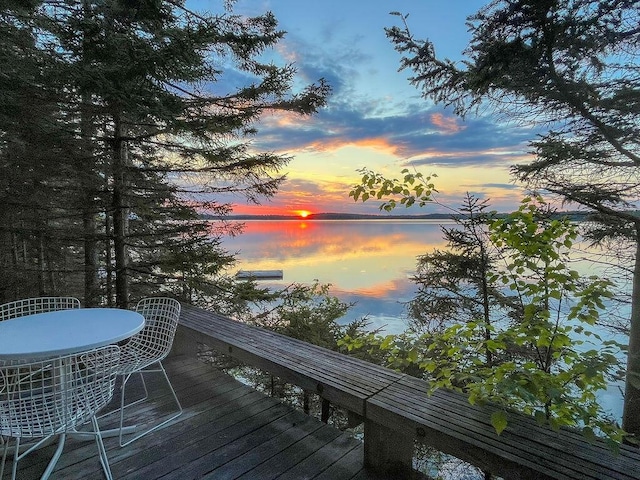 93 Eaton Point Rd, Deer Isle, ME 04627 - deck at dusk featuring a water view