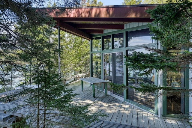 93 Eaton Point Rd, Deer Isle, ME 04627 - wooden terrace with a sunroom