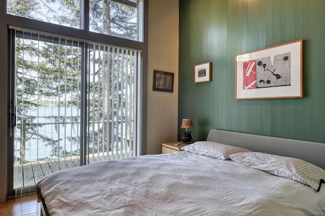 93 Eaton Point Rd, Deer Isle, ME 04627 - bedroom featuring a towering ceiling and wood finished floors