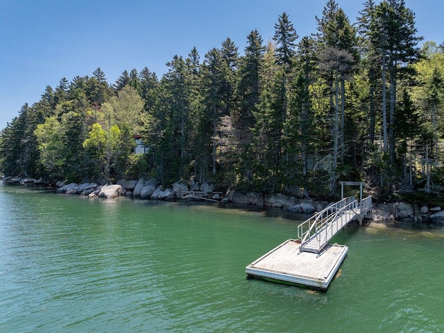 93 Eaton Point Rd, Deer Isle, ME 04627 - dock featuring a forest view and a water view