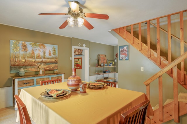 38 Johnson Cove Rd, Otis, ME 04605 - dining room featuring stairs and ceiling fan