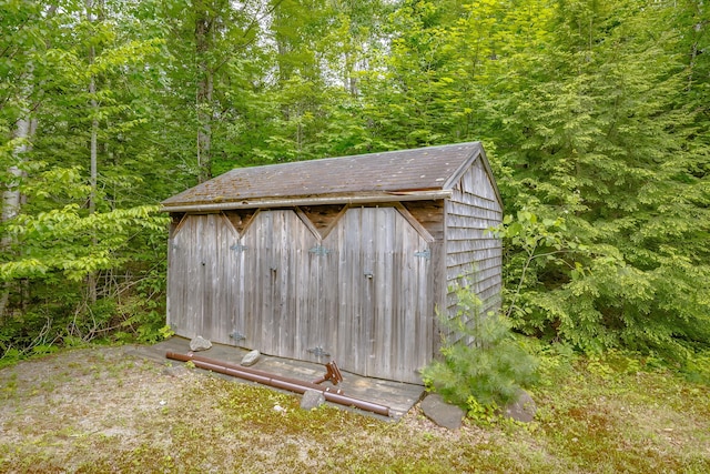 38 Johnson Cove Rd, Otis, ME 04605 - view of shed with a forest view