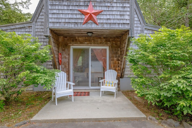 38 Johnson Cove Rd, Otis, ME 04605 - property entrance with a patio area