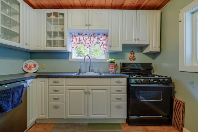 38 Johnson Cove Rd, Otis, ME 04605 - kitchen featuring black range with gas stovetop, dishwashing machine, wood ceiling, dark countertops, and white cabinetry