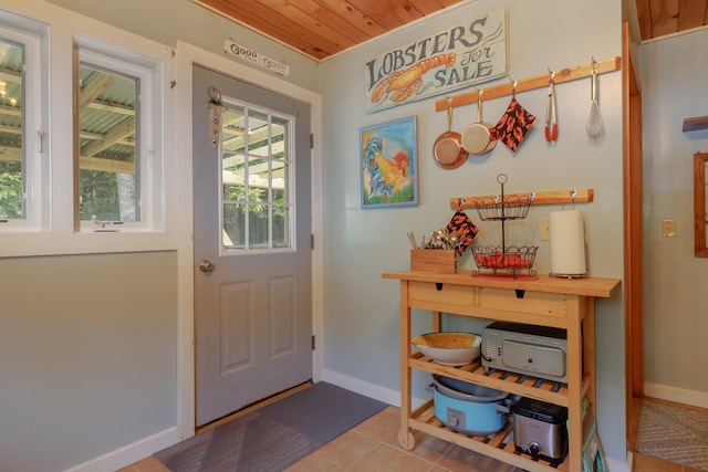 38 Johnson Cove Rd, Otis, ME 04605 - doorway to outside featuring tile patterned floors and wooden ceiling