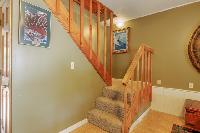 38 Johnson Cove Rd, Otis, ME 04605 - staircase featuring wood finished floors