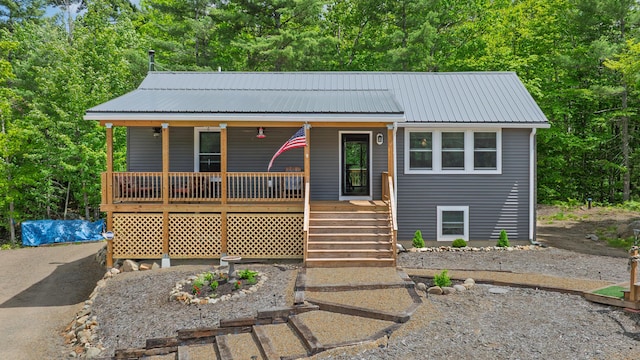 580 Spring St, Brownfield, ME 04010 - view of front of property with a porch and metal roof