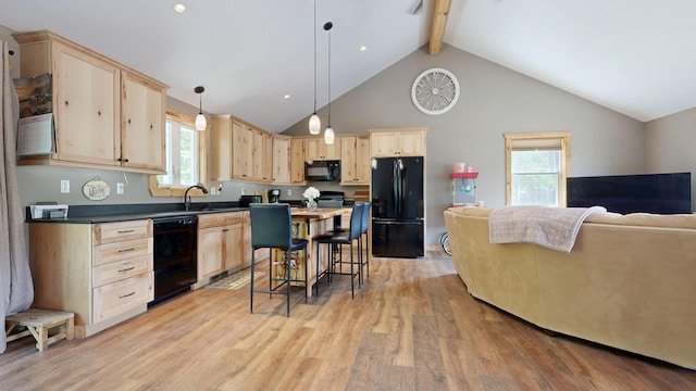 580 Spring St, Brownfield, ME 04010 - kitchen featuring black appliances, light brown cabinets, dark countertops, beamed ceiling, and light wood-style flooring
