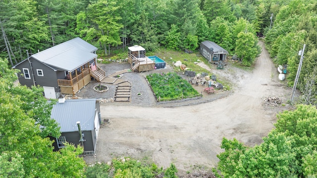 580 Spring St, Brownfield, ME 04010 - aerial view of property and surrounding area featuring a heavily wooded area