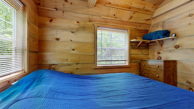 580 Spring St, Brownfield, ME 04010 - bedroom with wooden walls and multiple windows