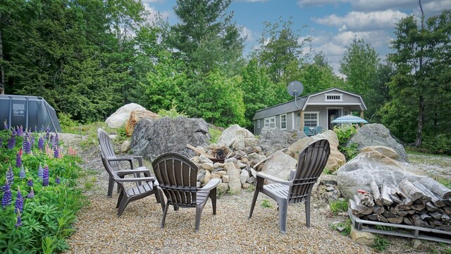 580 Spring St, Brownfield, ME 04010 - view of yard featuring a fire pit