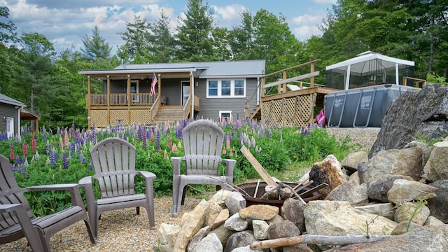 580 Spring St, Brownfield, ME 04010 - view of yard with stairs and a deck