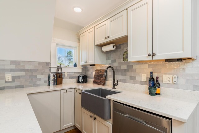 21 Fernald Ave Unit B, York, ME 03909 - kitchen with dishwasher, a sink, tasteful backsplash, and light stone countertops