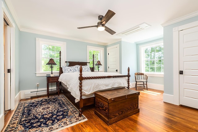 21 Fernald Ave Unit B, York, ME 03909 - bedroom featuring a baseboard heating unit, wood finished floors, ornamental molding, baseboards, and a ceiling fan