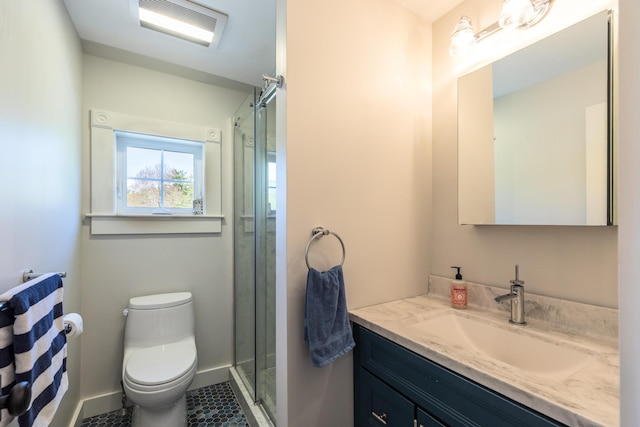 21 Fernald Ave Unit B, York, ME 03909 - bathroom with vanity, toilet, a shower stall, tile patterned flooring, and baseboards