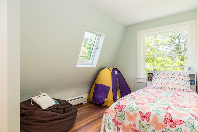 21 Fernald Ave Unit B, York, ME 03909 - bedroom with a baseboard radiator, wood finished floors, and a skylight
