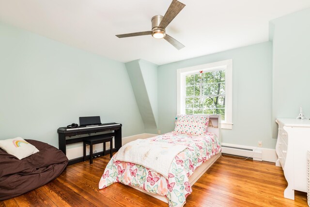 21 Fernald Ave Unit B, York, ME 03909 - bedroom with a baseboard radiator, wood finished floors, and a ceiling fan