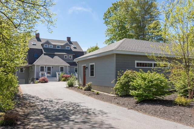 21 Fernald Ave Unit B, York, ME 03909 - view of front of property featuring a chimney and roof with shingles