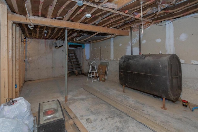 38 Greenridge Way, Jay, ME 04239 - unfinished below grade area featuring oil tank and stairway