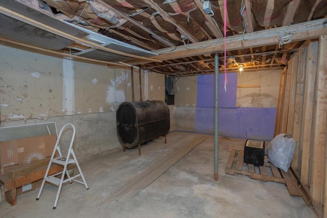 38 Greenridge Way, Jay, ME 04239 - unfinished basement featuring oil tank
