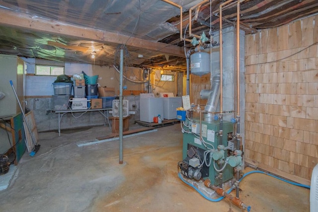38 Greenridge Way, Jay, ME 04239 - below grade area featuring washer / clothes dryer and a heating unit