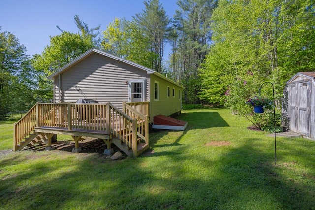 38 Greenridge Way, Jay, ME 04239 - back of house featuring a lawn, a wooden deck, and stairway