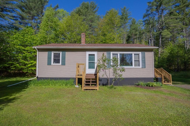 38 Greenridge Way, Jay, ME 04239 - manufactured / mobile home featuring a front yard and a chimney