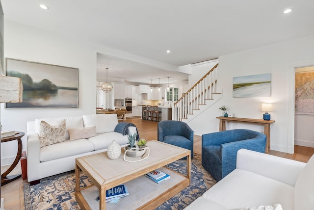 239A Foreside Rd ., Unit Falmouth, ME 04105 - living room featuring stairs, recessed lighting, wood finished floors, and baseboards
