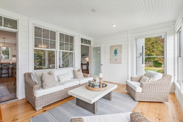 239A Foreside Rd ., Unit Falmouth, ME 04105 - living area featuring hardwood / wood-style flooring and wood ceiling