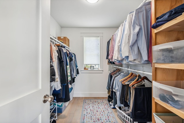 239A Foreside Rd ., Unit Falmouth, ME 04105 - walk in closet featuring wood finished floors