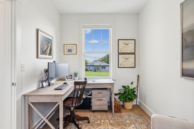 239A Foreside Rd ., Unit Falmouth, ME 04105 - office area featuring wood finished floors and baseboards