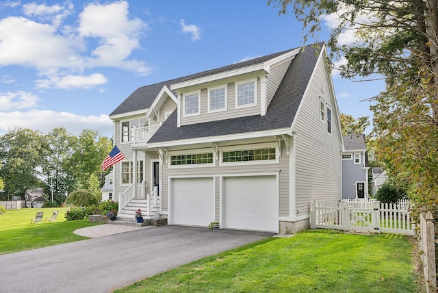 239A Foreside Rd ., Unit Falmouth, ME 04105 - view of front of house with asphalt driveway, an attached garage, a balcony, a gate, and roof with shingles