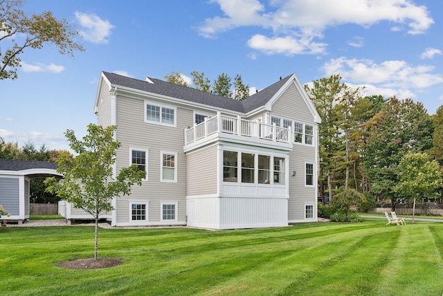 239A Foreside Rd ., Unit Falmouth, ME 04105 - back of house featuring a balcony and a lawn