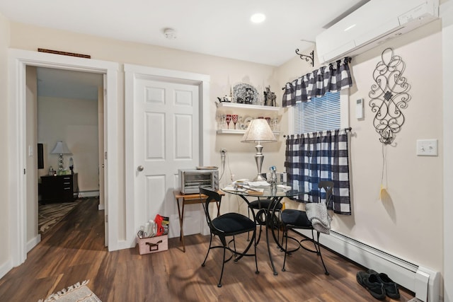 128 Alfred St, Biddeford, ME 04005 - dining space with dark wood-style floors, a baseboard heating unit, baseboards, and recessed lighting