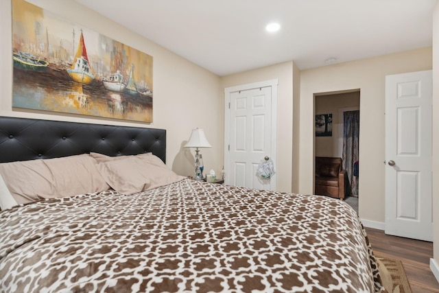 128 Alfred St, Biddeford, ME 04005 - bedroom with wood finished floors, recessed lighting, and baseboards