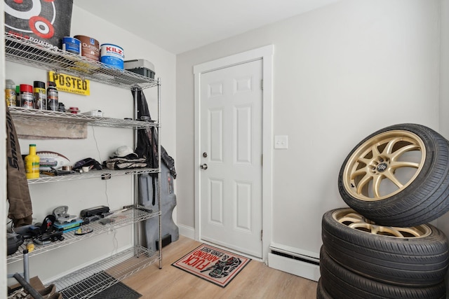 128 Alfred St, Biddeford, ME 04005 - entryway with a baseboard heating unit and wood finished floors