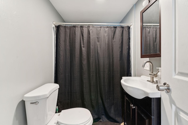 128 Alfred St, Biddeford, ME 04005 - bathroom with toilet, vanity, and a shower with curtain