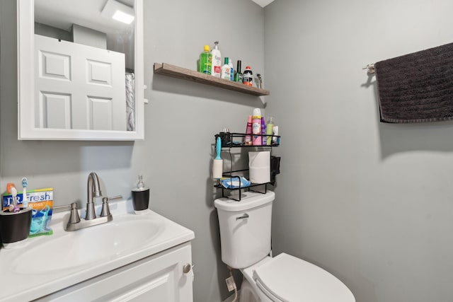 128 Alfred St, Biddeford, ME 04005 - bathroom featuring toilet and vanity