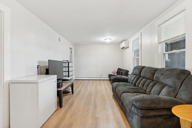 128 Alfred St, Biddeford, ME 04005 - living area featuring an AC wall unit, a baseboard heating unit, and light wood-type flooring