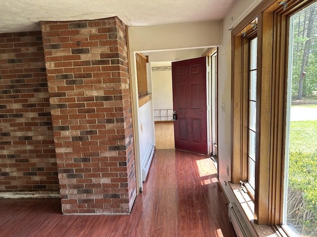 3 Harding Way, Kennebunk, ME 04043 - hallway featuring dark wood finished floors, baseboard heating, and a textured ceiling