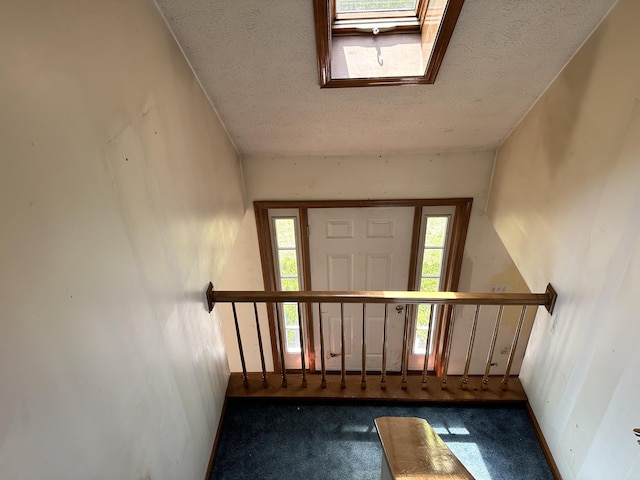 3 Harding Way, Kennebunk, ME 04043 - entryway featuring a textured ceiling, carpet, and plenty of natural light