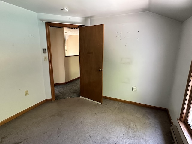 3 Harding Way, Kennebunk, ME 04043 - empty room with a baseboard heating unit, carpet flooring, baseboards, lofted ceiling, and a smoke detector